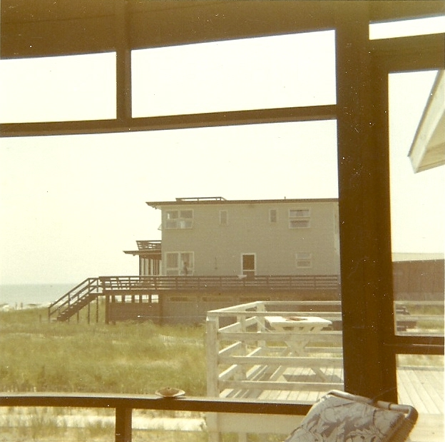 Screen enclosed porch at 20 Dune Road, Bethany Beach. The property at 16 Dune Road, owned by Hank Forest, is in the background. The property at 12 Dune Road, the "boat house", is also in the background.
Courtesy: Greg Pichler